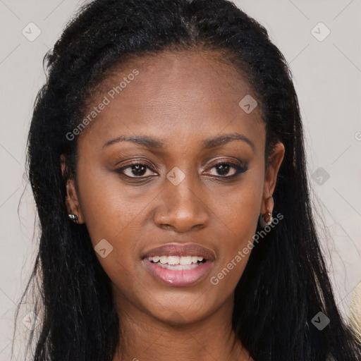 Joyful black young-adult female with long  brown hair and brown eyes