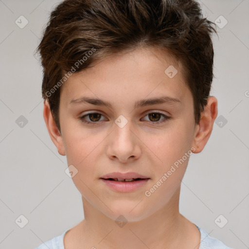 Joyful white child female with short  brown hair and brown eyes