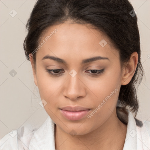 Joyful latino young-adult female with medium  brown hair and brown eyes