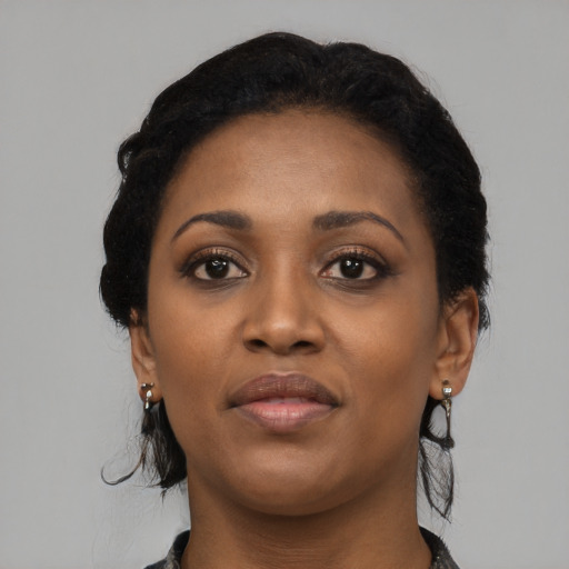 Neutral black young-adult female with medium  black hair and brown eyes