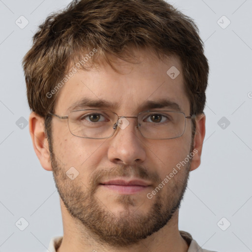 Joyful white adult male with short  brown hair and brown eyes