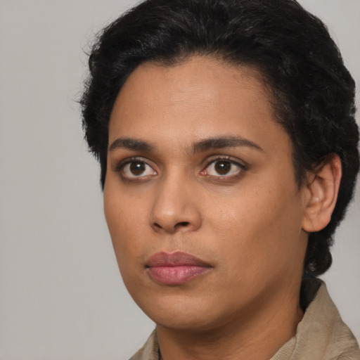Neutral latino young-adult female with short  brown hair and brown eyes