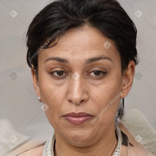 Joyful white adult female with short  brown hair and brown eyes