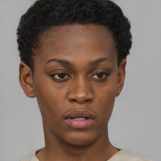 Neutral black young-adult female with short  black hair and brown eyes