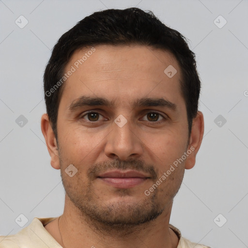 Joyful white young-adult male with short  black hair and brown eyes