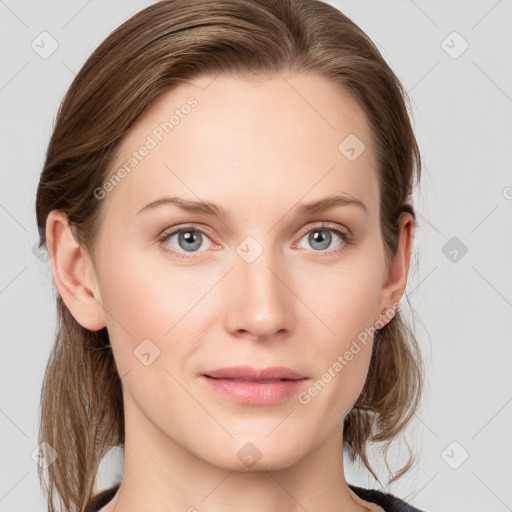 Joyful white young-adult female with medium  brown hair and blue eyes