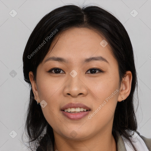 Joyful asian young-adult female with medium  black hair and brown eyes