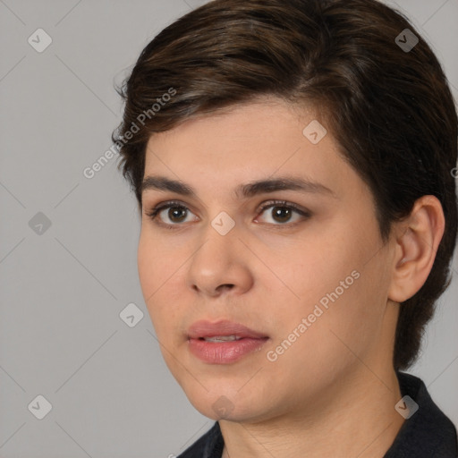 Neutral white young-adult female with medium  brown hair and brown eyes