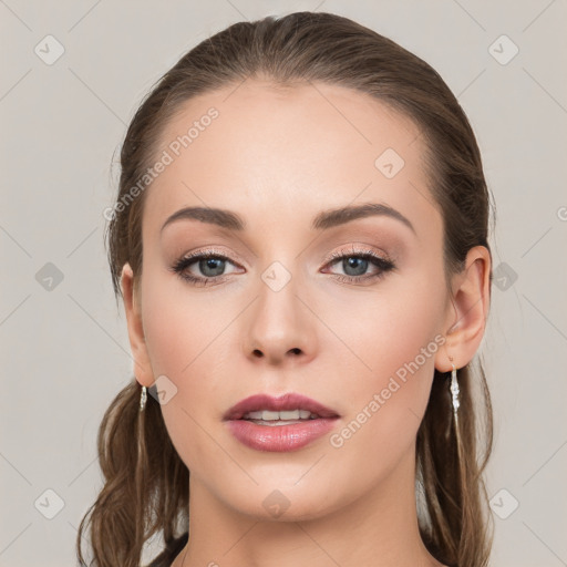 Neutral white young-adult female with long  brown hair and grey eyes