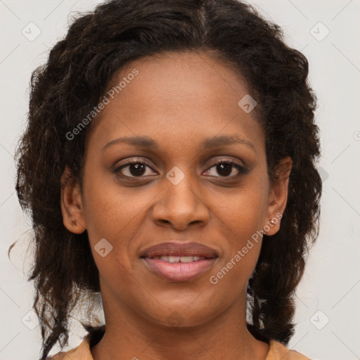 Joyful black young-adult female with medium  brown hair and brown eyes