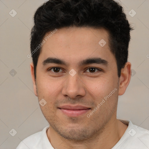 Joyful latino young-adult male with short  brown hair and brown eyes