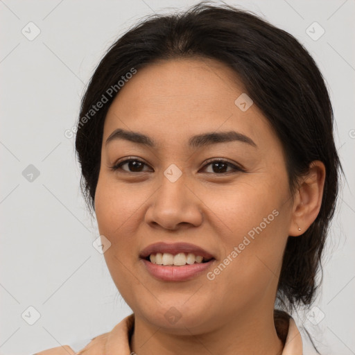 Joyful asian young-adult female with medium  brown hair and brown eyes