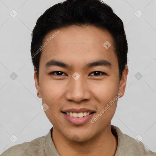 Joyful asian young-adult male with short  black hair and brown eyes