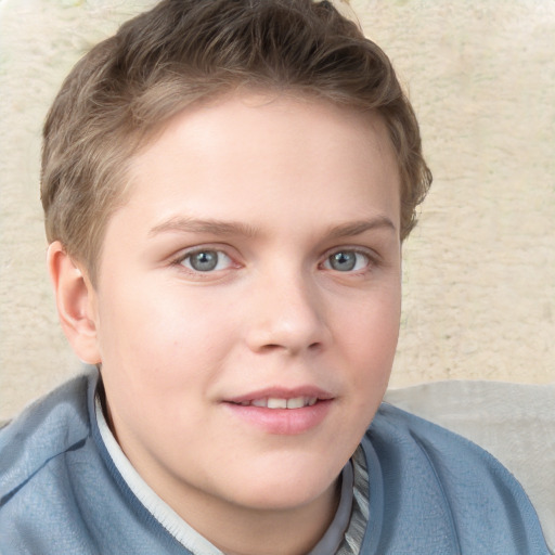 Joyful white child male with short  brown hair and grey eyes