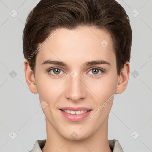 Joyful white young-adult female with short  brown hair and grey eyes