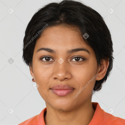 Joyful black young-adult female with medium  black hair and brown eyes