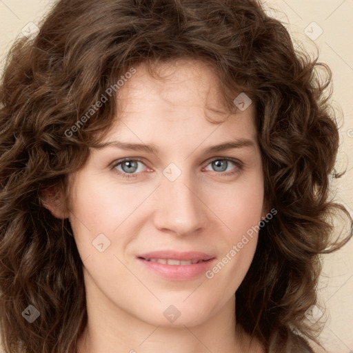 Joyful white young-adult female with long  brown hair and green eyes