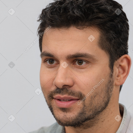 Neutral white young-adult male with short  black hair and brown eyes