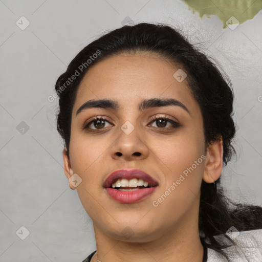 Joyful latino young-adult female with medium  black hair and brown eyes