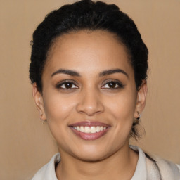 Joyful latino young-adult female with short  brown hair and brown eyes