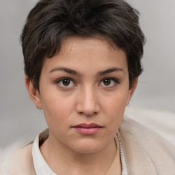 Neutral white young-adult female with short  brown hair and brown eyes