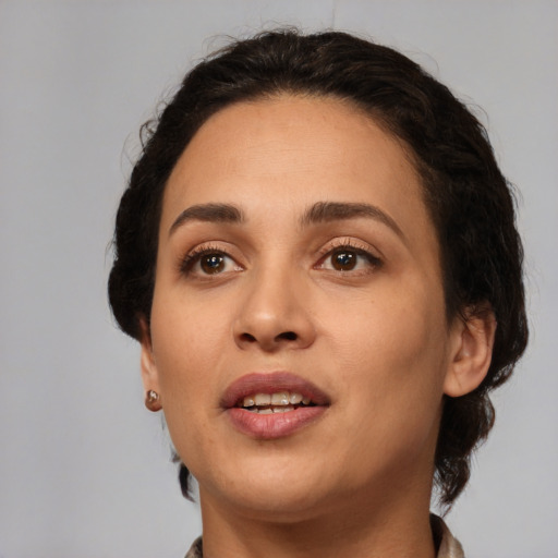 Joyful white young-adult female with medium  brown hair and brown eyes