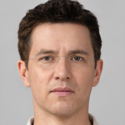 Neutral white adult male with short  brown hair and brown eyes