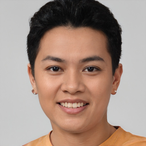 Joyful latino young-adult female with short  black hair and brown eyes