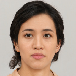 Neutral asian young-adult female with medium  black hair and brown eyes