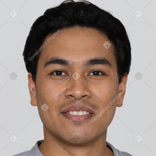 Joyful asian young-adult male with short  black hair and brown eyes