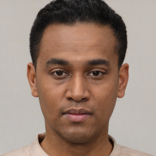 Neutral latino young-adult male with short  black hair and brown eyes