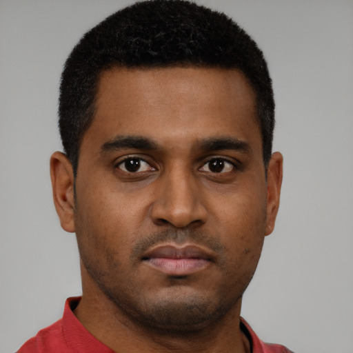 Neutral black young-adult male with short  brown hair and brown eyes