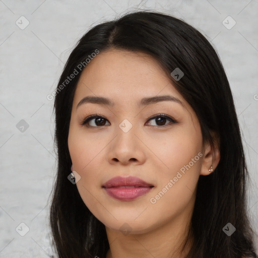 Joyful asian young-adult female with long  black hair and brown eyes