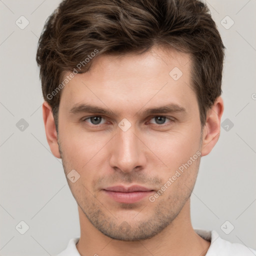 Neutral white young-adult male with short  brown hair and brown eyes