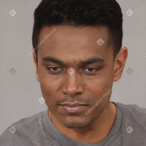 Neutral latino young-adult male with short  black hair and brown eyes