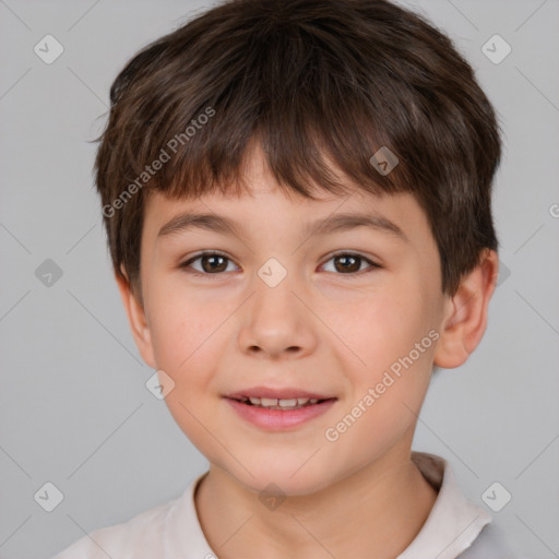 Joyful white child male with short  brown hair and brown eyes