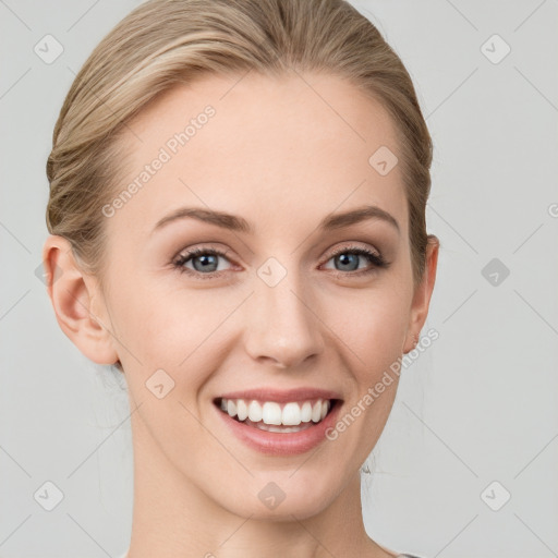 Joyful white young-adult female with medium  brown hair and blue eyes