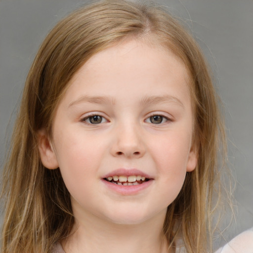 Joyful white child female with medium  brown hair and brown eyes