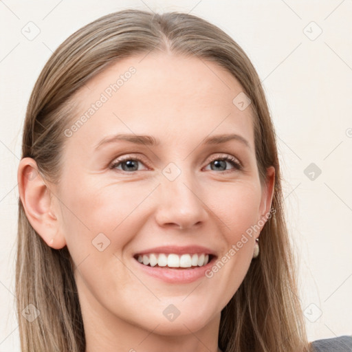 Joyful white young-adult female with long  brown hair and grey eyes