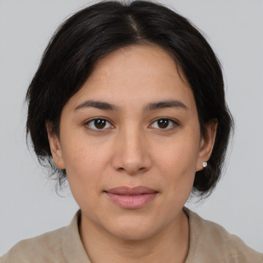 Joyful asian young-adult female with medium  brown hair and brown eyes