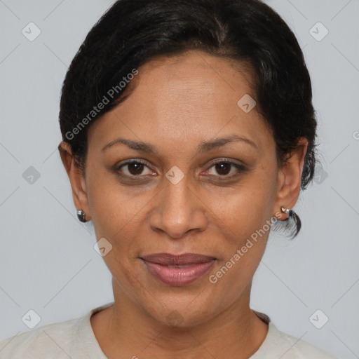 Joyful latino adult female with short  brown hair and brown eyes