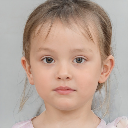 Neutral white child female with medium  brown hair and brown eyes