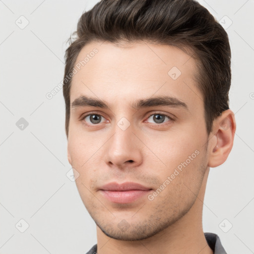 Neutral white young-adult male with short  brown hair and brown eyes