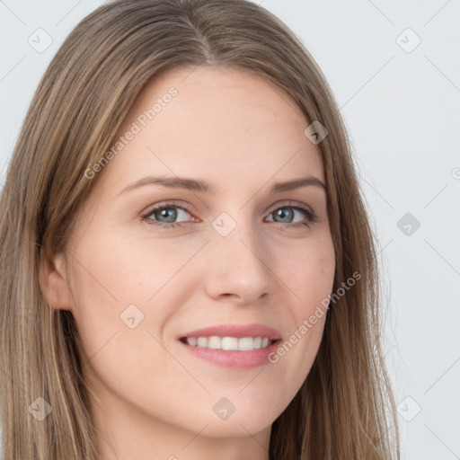 Joyful white young-adult female with long  brown hair and grey eyes