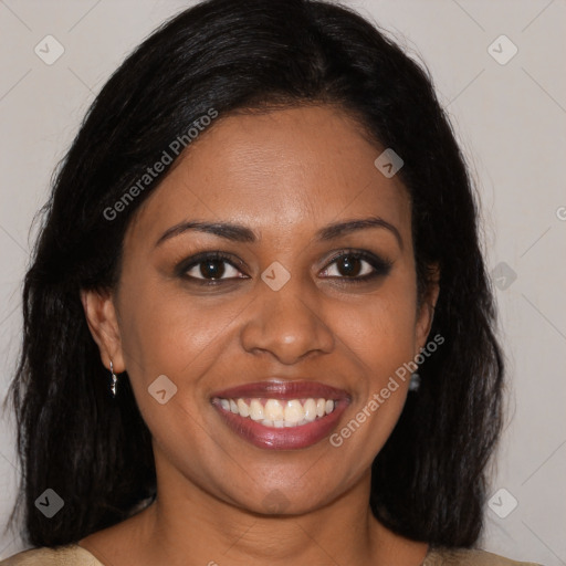 Joyful black young-adult female with medium  brown hair and brown eyes