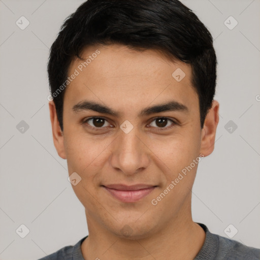 Joyful latino young-adult male with short  brown hair and brown eyes