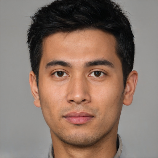 Neutral asian young-adult male with short  black hair and brown eyes