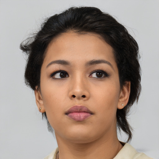 Neutral asian young-adult female with medium  brown hair and brown eyes