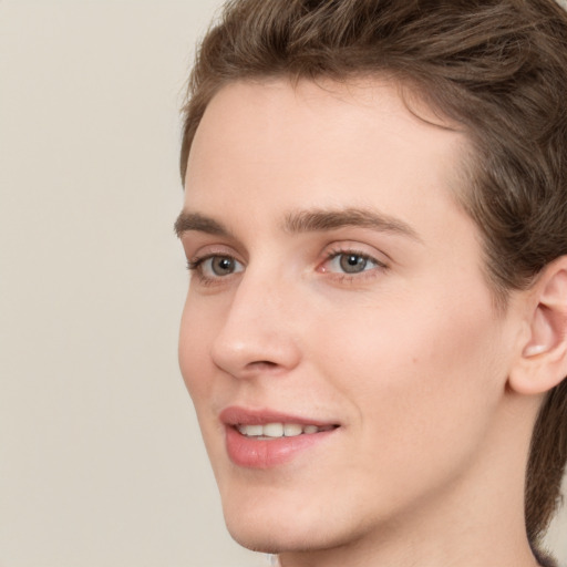 Joyful white young-adult male with medium  brown hair and brown eyes