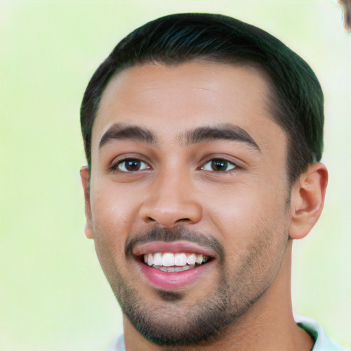 Joyful latino young-adult male with short  black hair and brown eyes